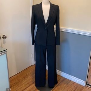 Tahari Woman’s Business Suit.